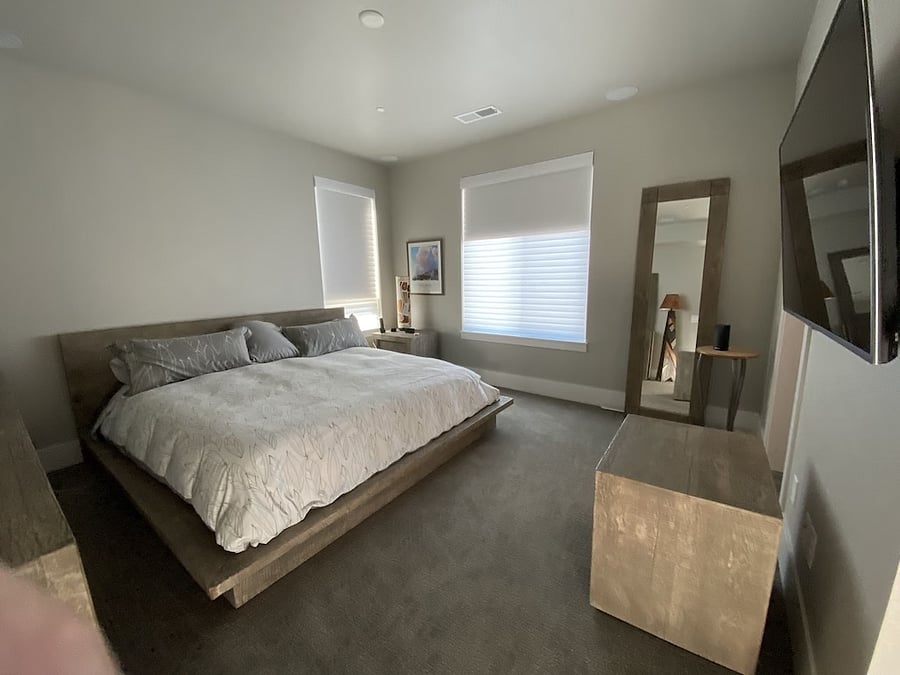 Master bedroom with RH furnishings and king-sized bed.
