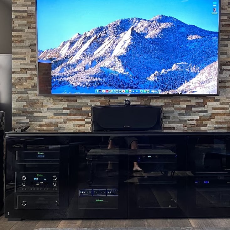 85" Sony TV, AppleTV+ and ATMOS sound system with McIntosh and B&W tech.