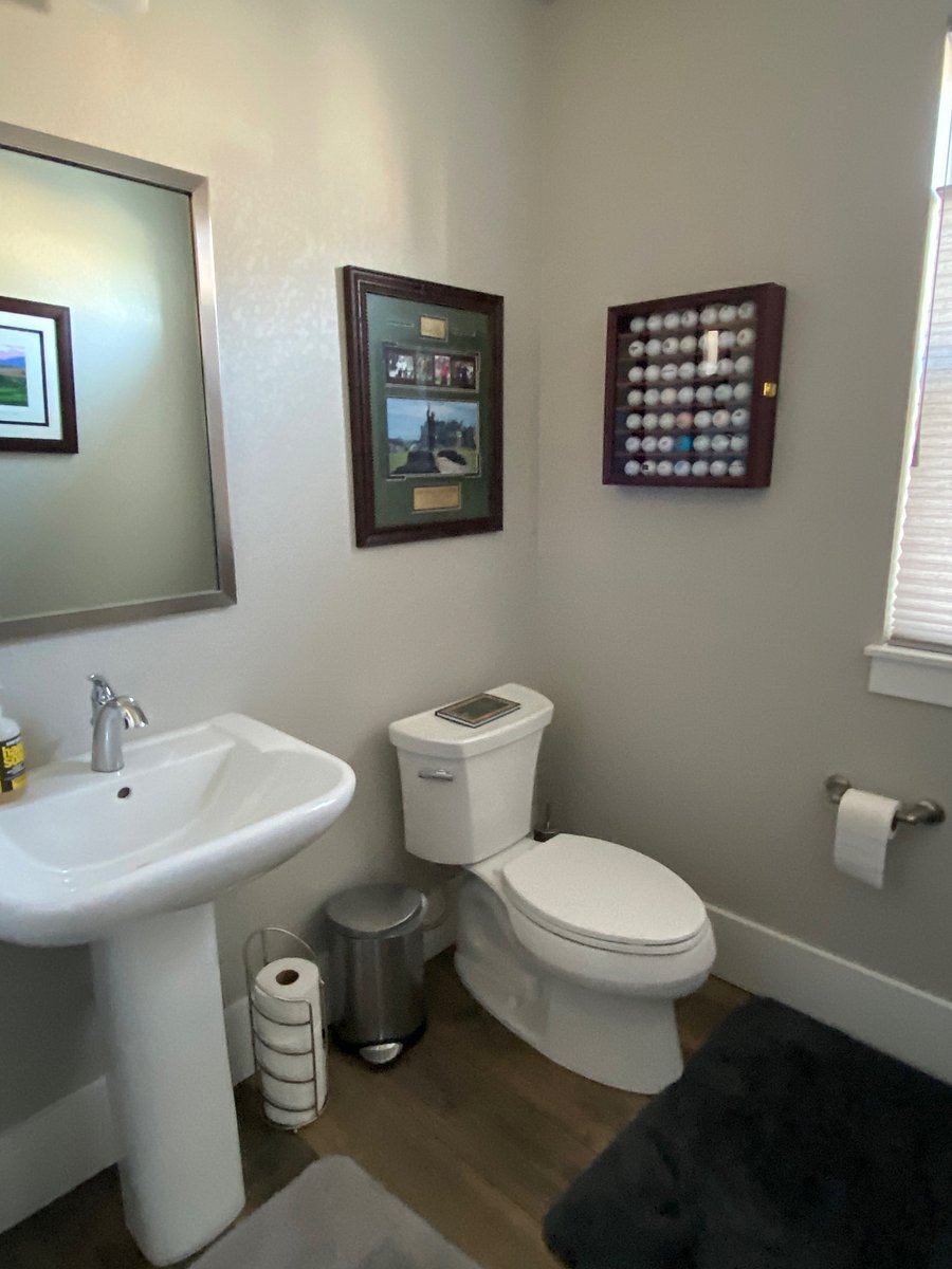 Mian floor powder room just off the kitchen.