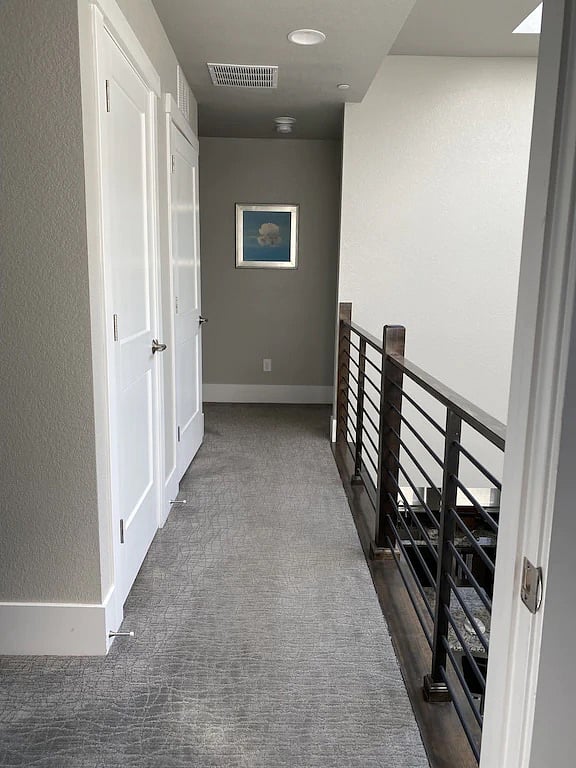 Breezeway from master to 2nd bedroom. Laundry room on the left.
