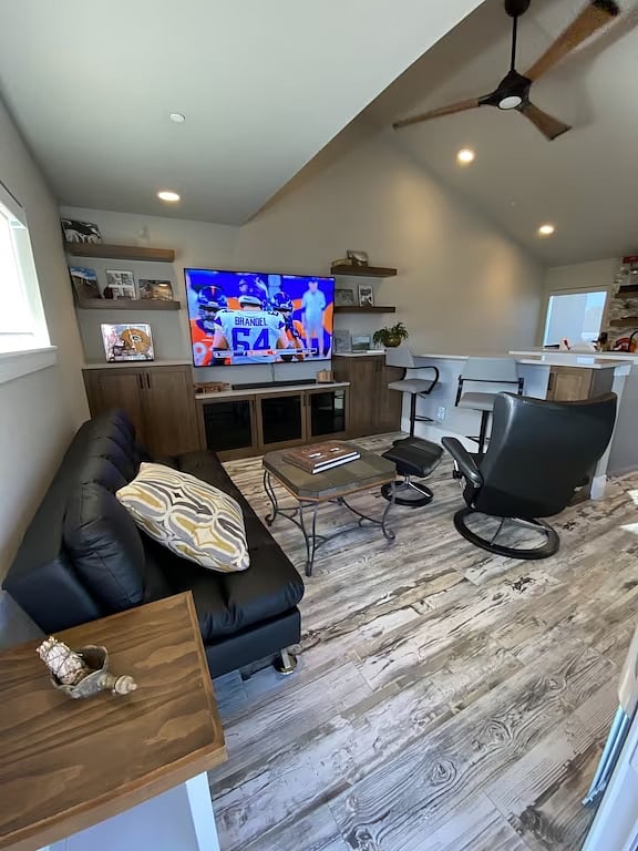 4th floor room with bar area, chair, futon sleeper.
