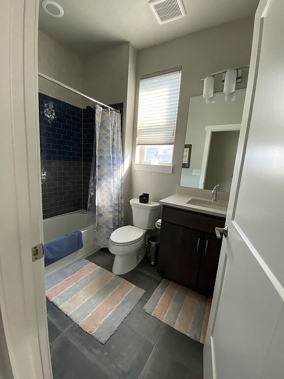 Full guest bathroom with tub.