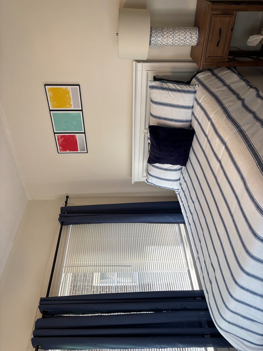 Room darkening curtains in bedroom