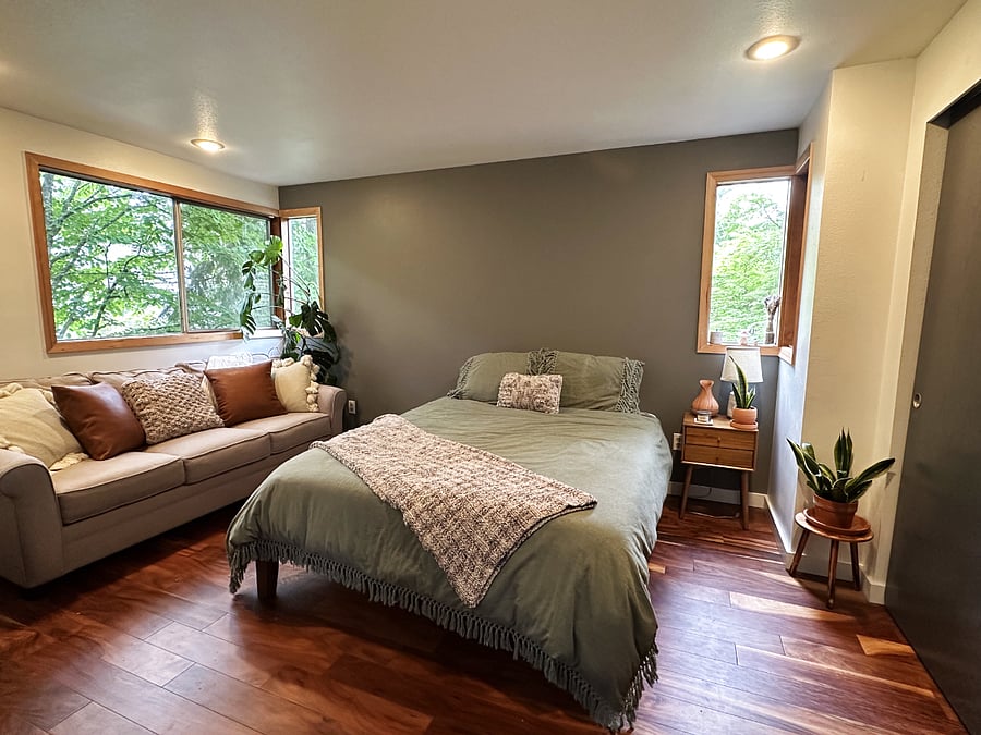 Upstairs secondary master suite with attached private full bathroom.