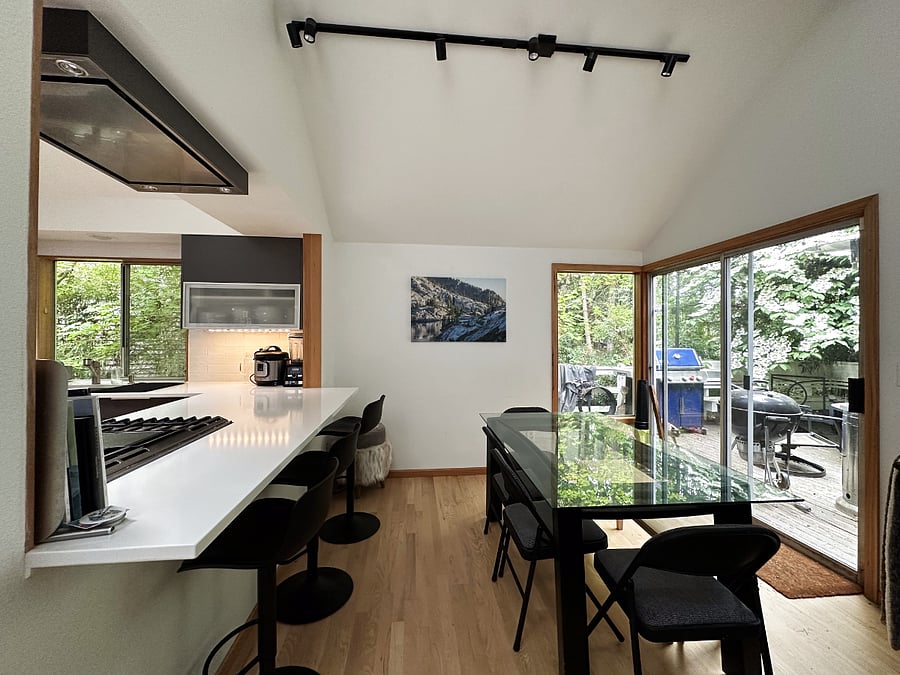 Overhanging counter special for hosts who like to cook! A space to interact while you're at work in the kitchen. I hope you love it as much as I do.