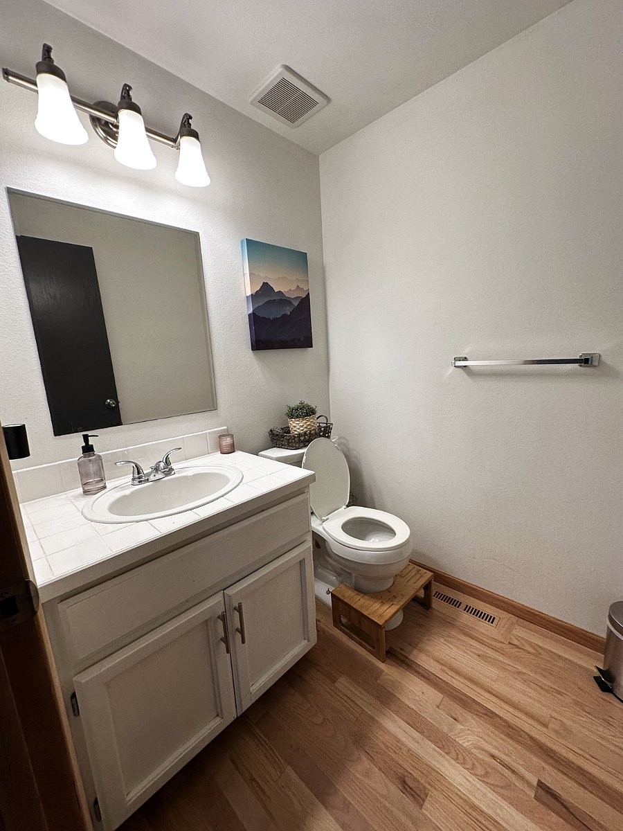 Half-bath on main floor for guest use.