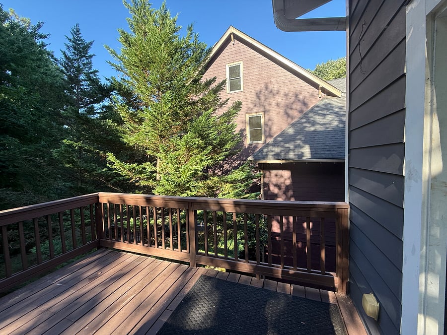 Large external deck features a Big Green Egg and a Blackstone grill.