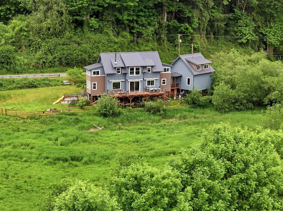 Located on 6 acres of pasture with private stream access. 