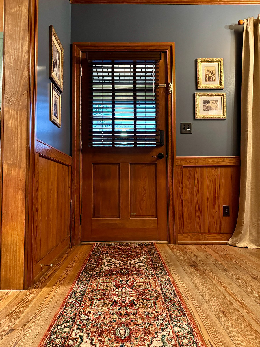 Vintage local photographs complement the space.