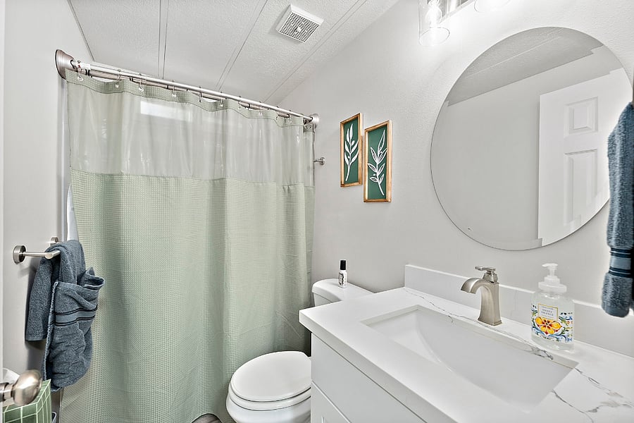 Second bathroom next to non-primary bedrooms