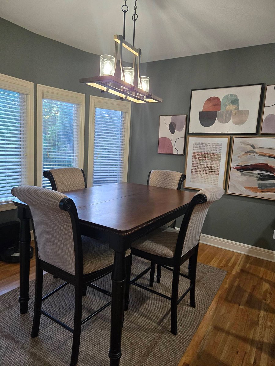 Dining table off kitchen, expandable with bar chairs