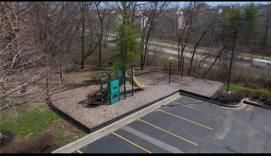 Neighborhood playground next to pool at entrance