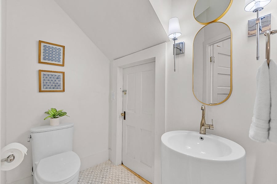 Guest bath off downstairs hall.