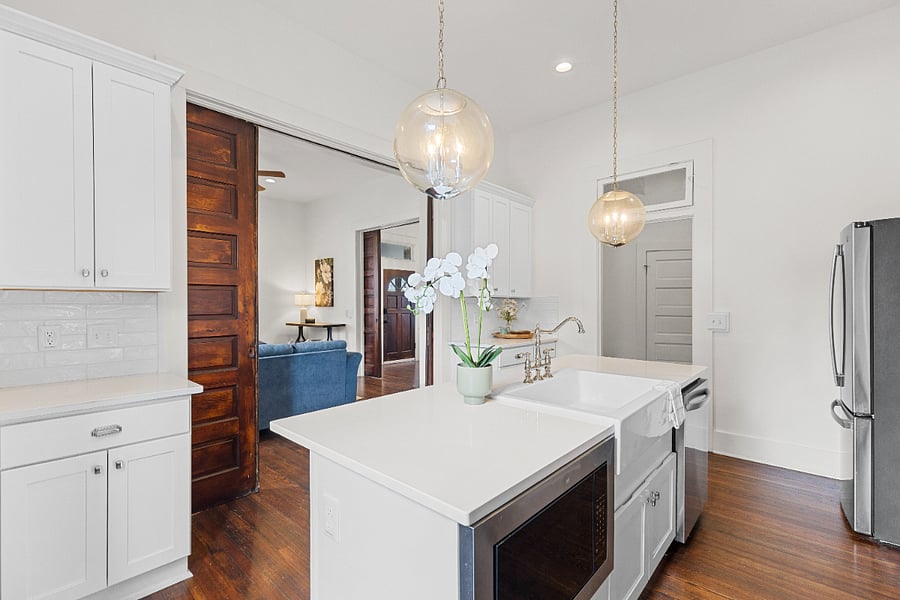 Built in microwave, farmhouse sink, coffee area.
