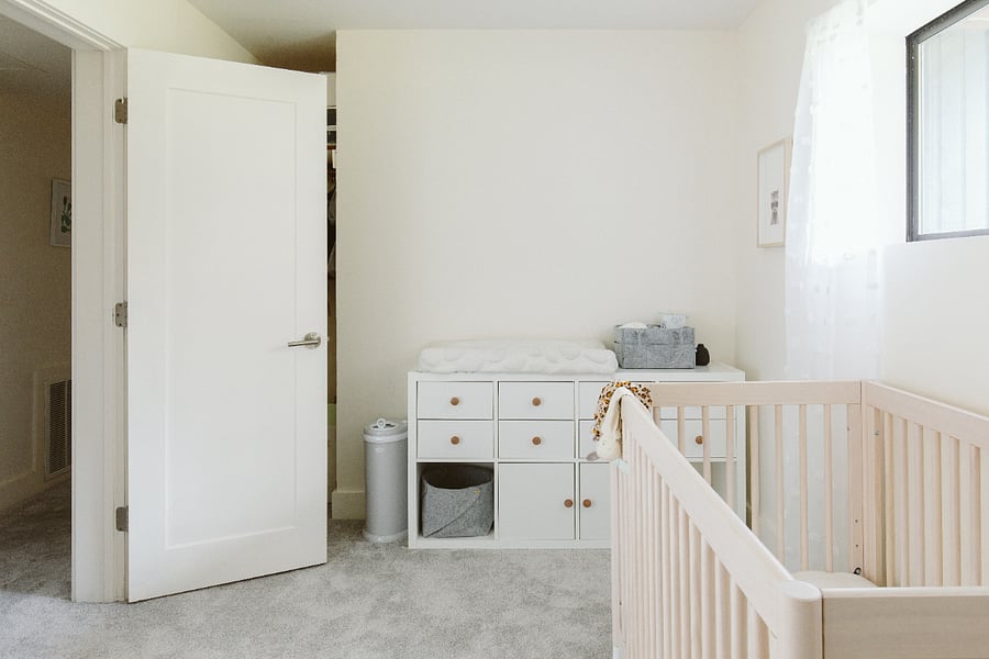 Full-Size Babyletto Crib, changing station (including diaper pail), dresser and Rocking Chair in Lower Level Bedroom 3