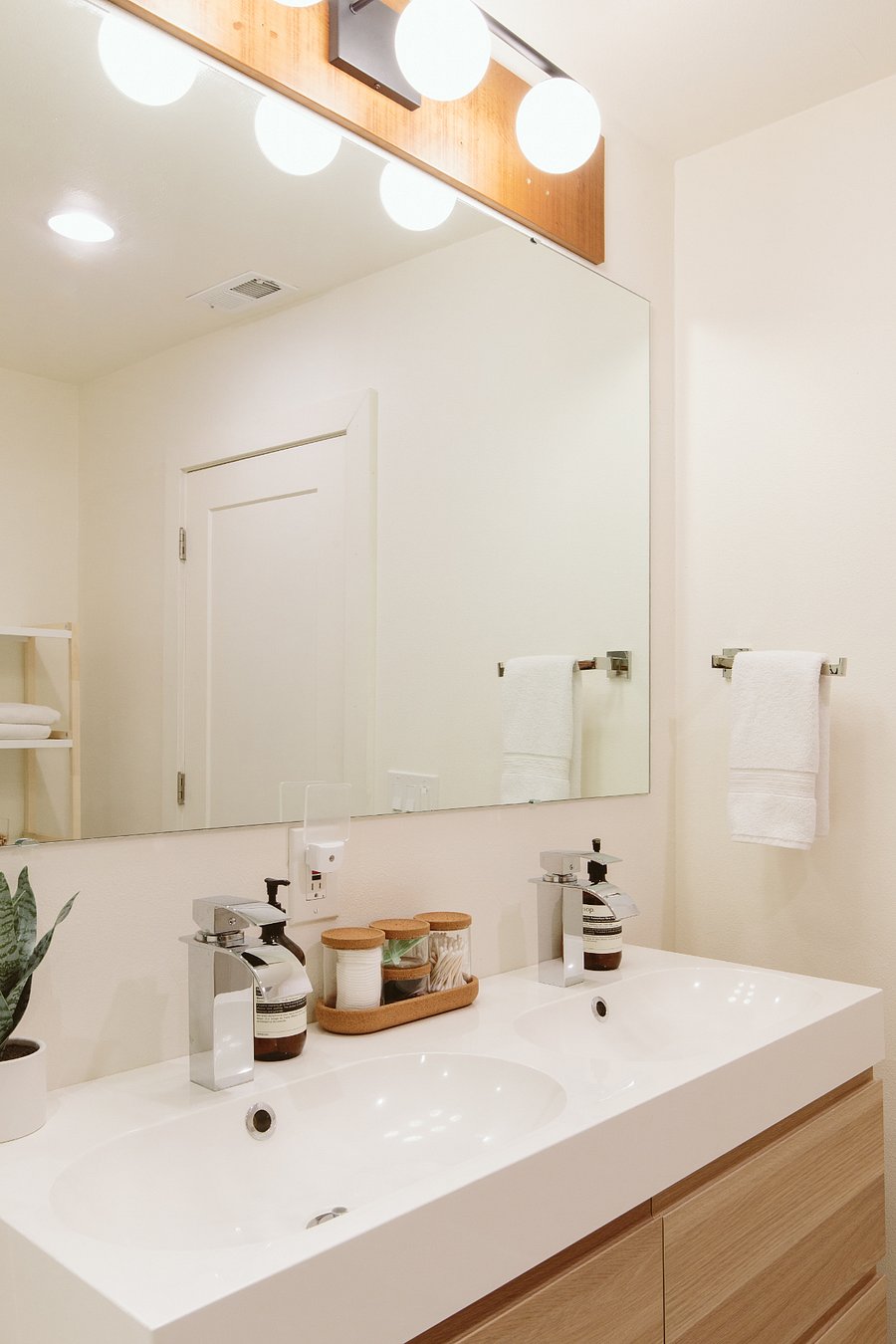 Double Sink and Shower in Full Lower Level Bathroom 1