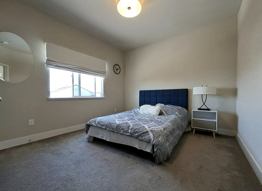 Upstairs bedroom #2 with large closet & TV