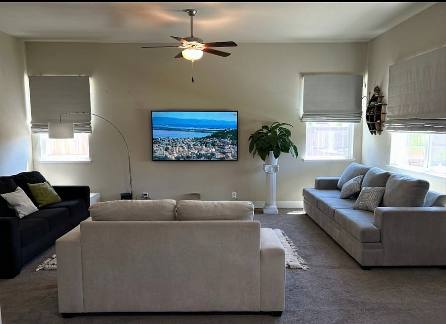 Living Room with TV and multiiple sitting areas