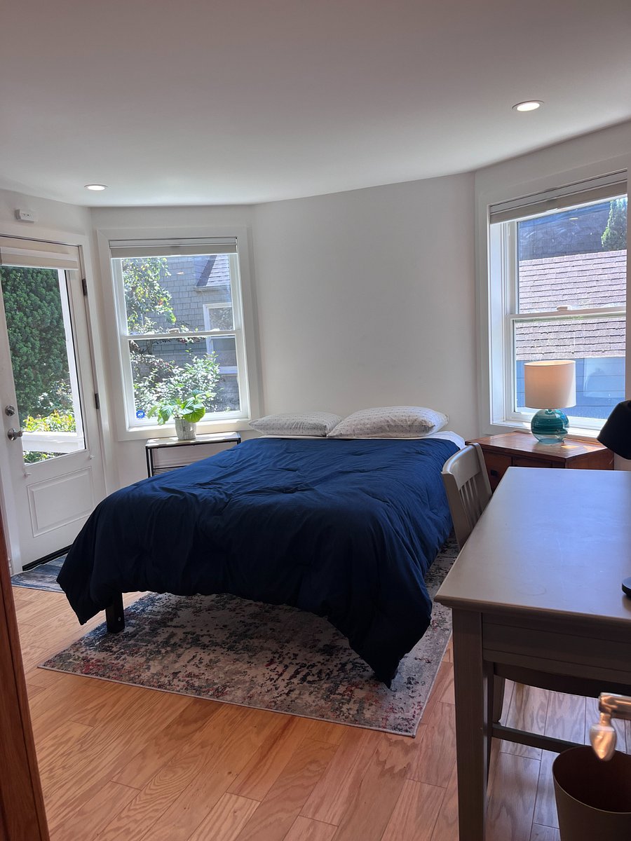 Bed as viewed from bathroom