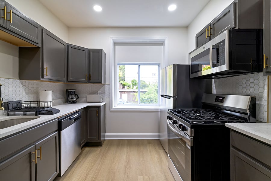 Kitchen with Microwave, fridge and sink