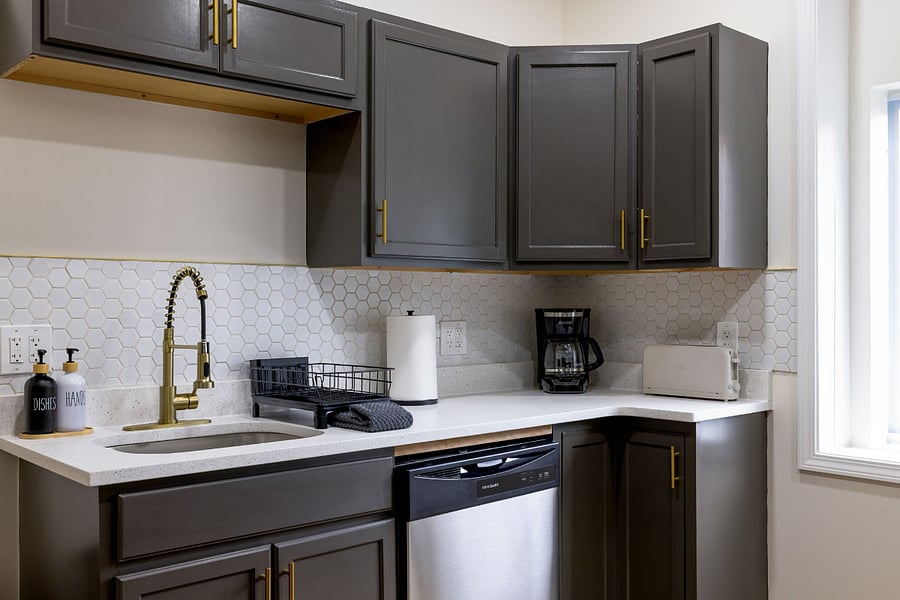 Kitchen sink with coffee maker.