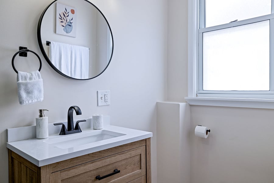 Bathroom vanity and toilet