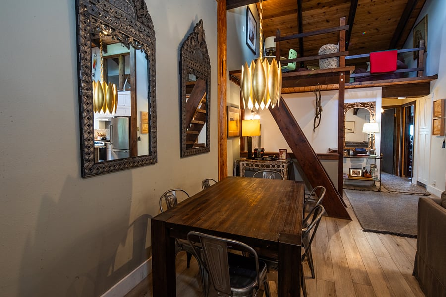 dining area with view of loft
