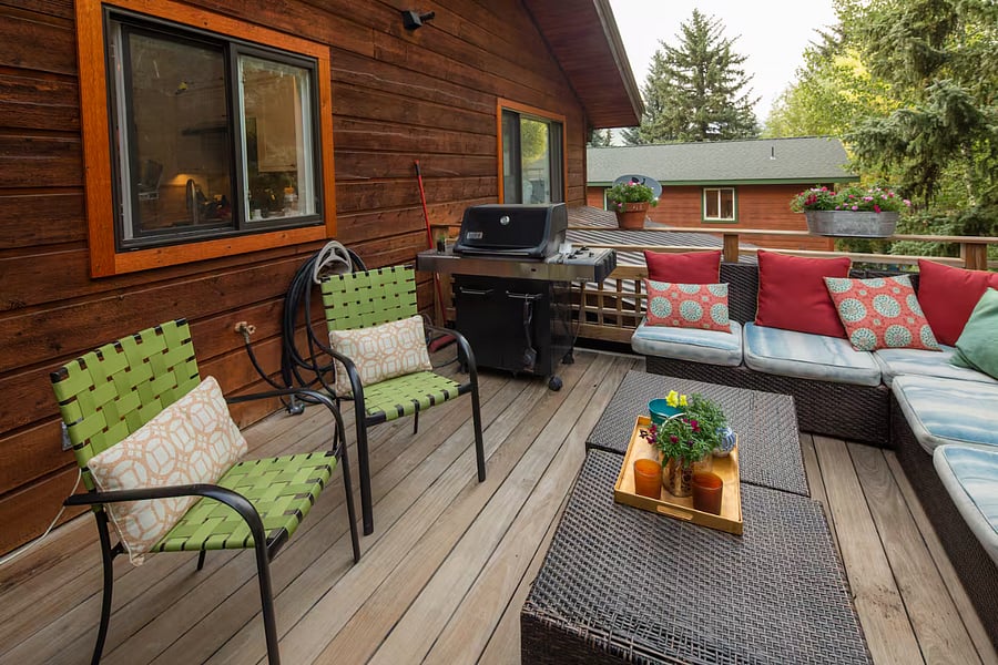 Grill piped to the city for gas anytime. Patio furniture is out in the summer months.
