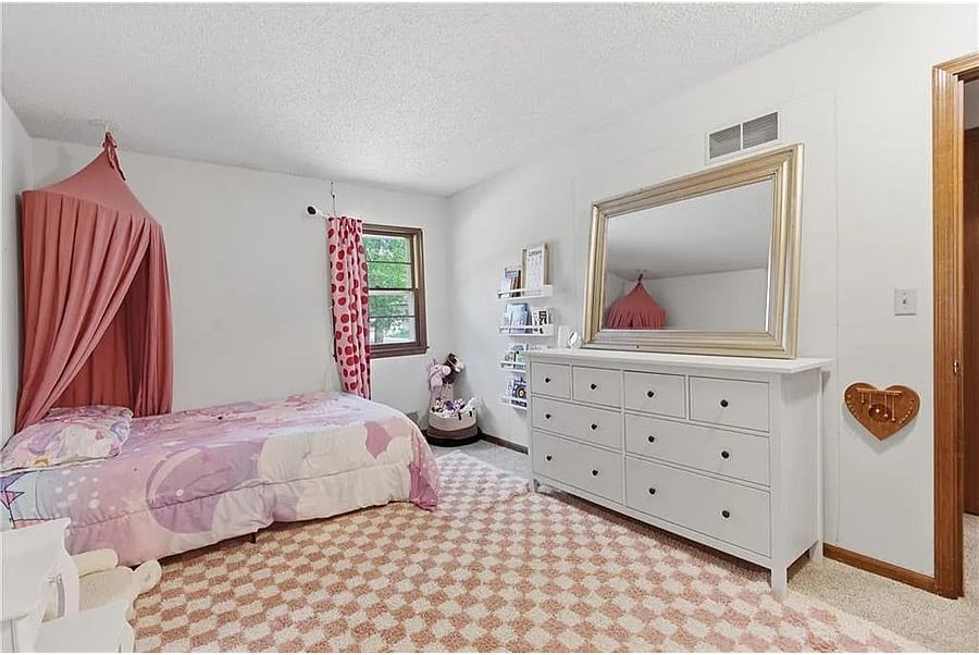 Charming and cozy bedroom with soft natural light, stylish furnishings, and a peaceful relaxing atmosphere.