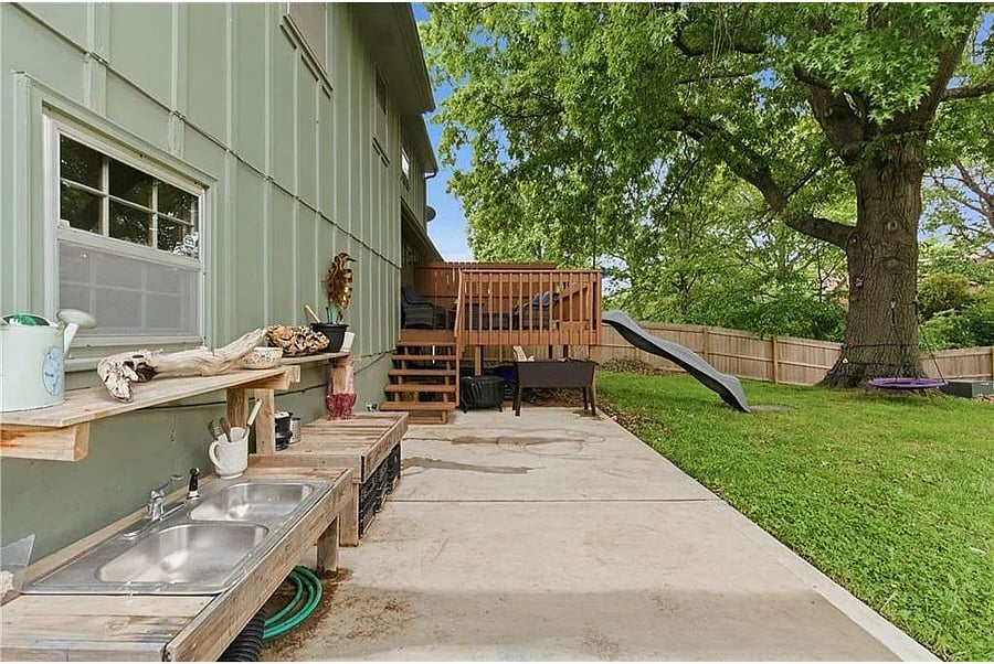 Spacious outdoor entertaining area with plenty of room for gatherings, fresh air, and family fun in a quiet residential setting.