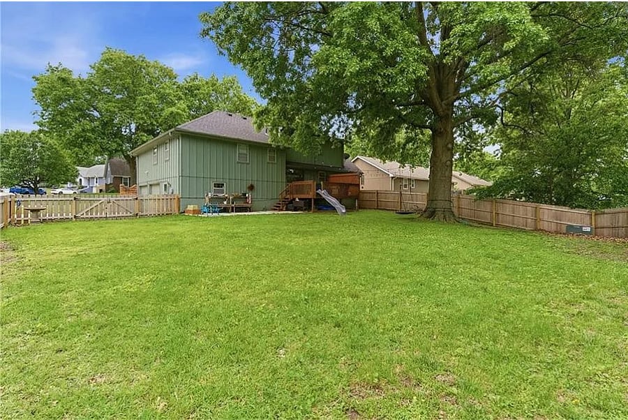 Expansive backyard with plenty of open green space, perfect for families, outdoor activities, and relaxing evenings during your stay.