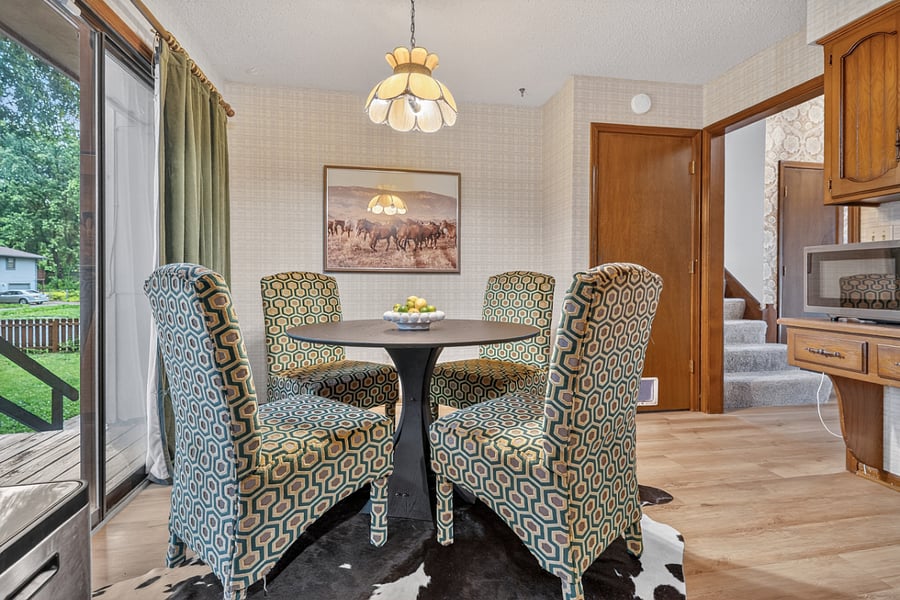 Cozy dining nook perfect for morning coffee, casual meals, or intimate conversations.