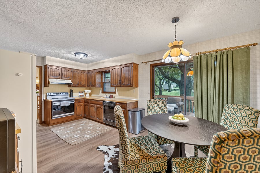 Spacious full kitchen with open flow, ample seating, and a comfortable layout for cooking and gathering.