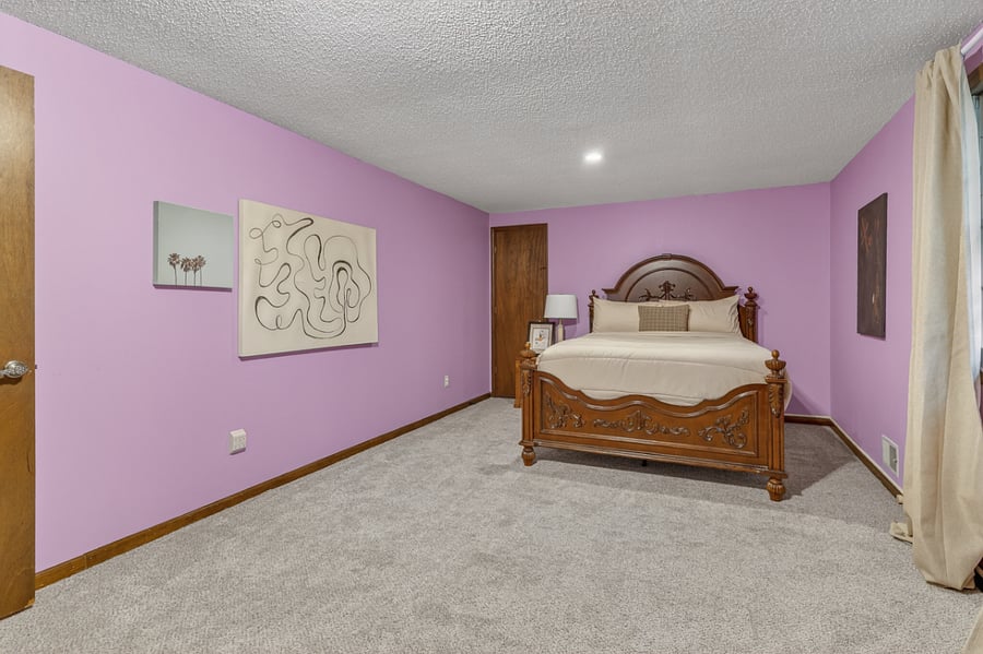 Large airy bedroom with elegant furnishings and an open layout perfect for extended stays.
