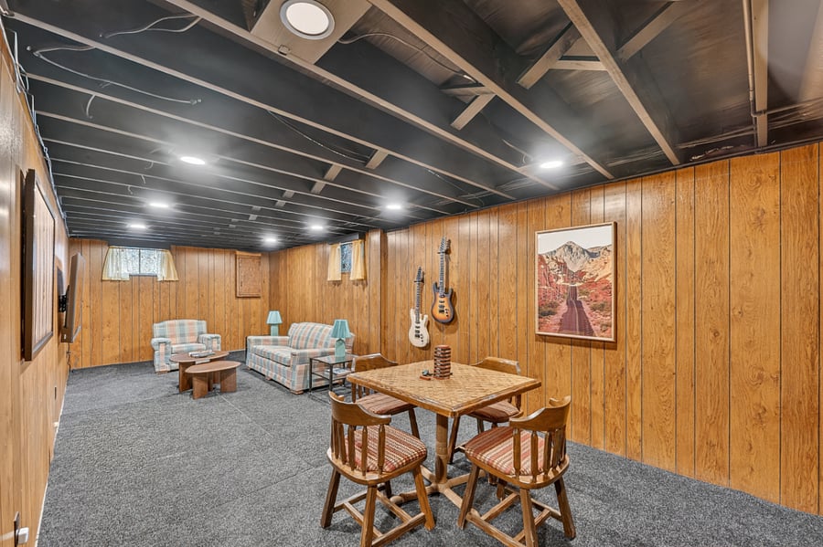Open basement retreat with flexible space for entertainment, games, and family gatherings.