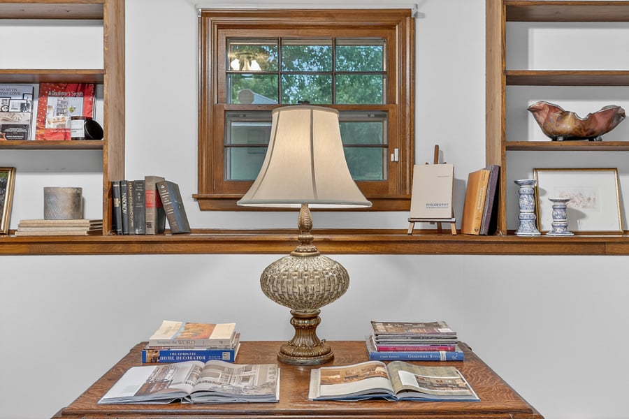Peaceful study corner with warm natural light, decorative accents, and a relaxing work atmosphere.