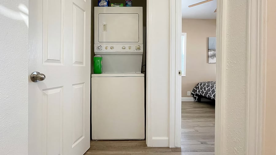 In-unit laundry center with washer and dryer.