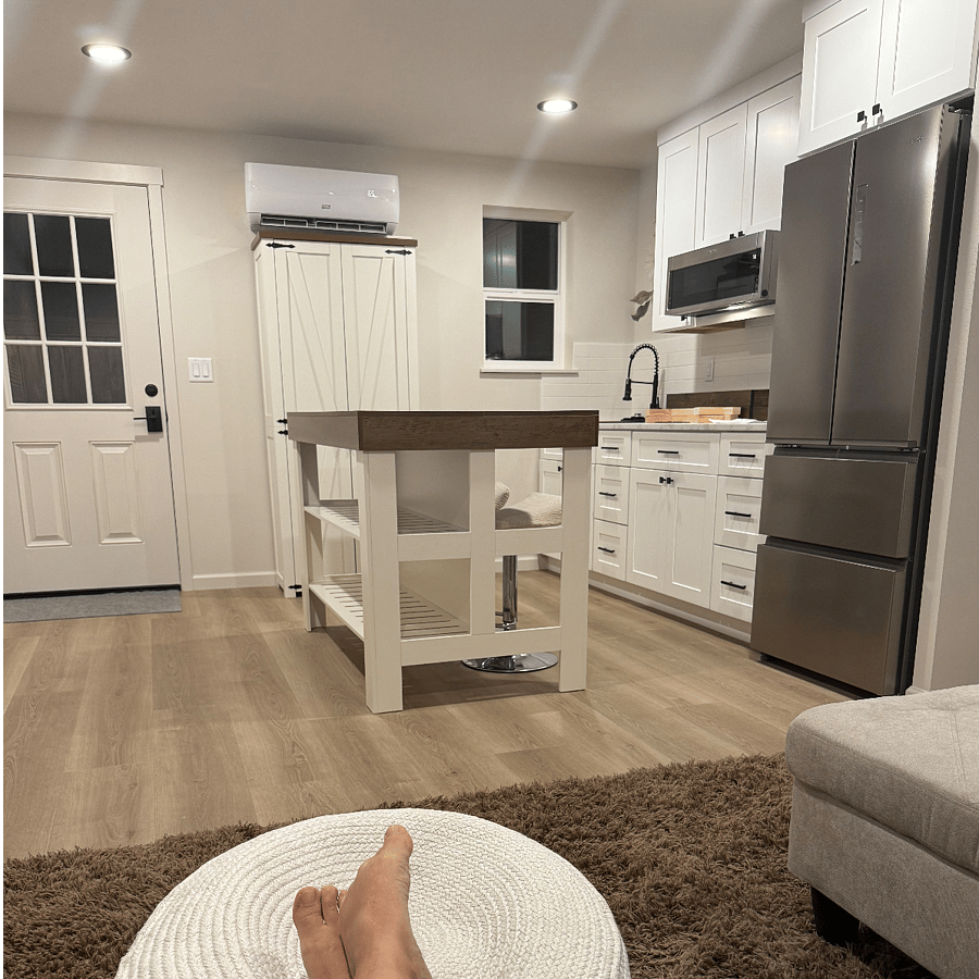 Island with 2 barstools Fridge has Icemaker Minisplit Heat/AC unit  