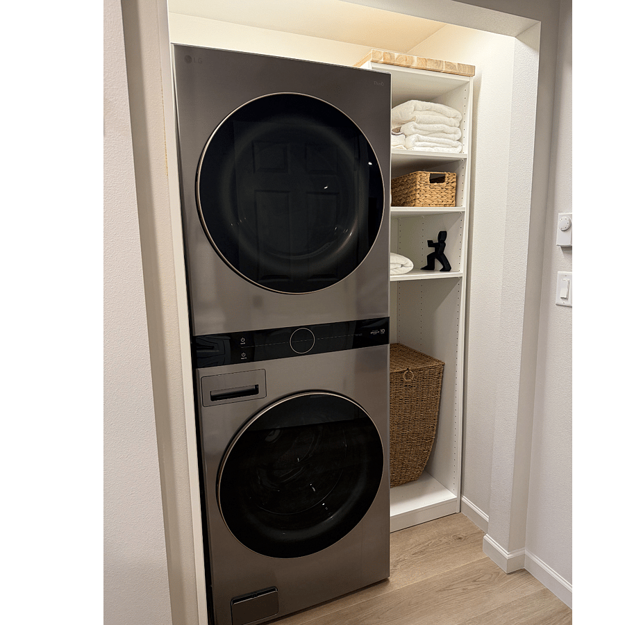 full capacity washer and dryer in bathroom 