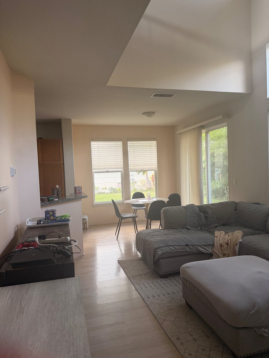 Living/dining area. Kitchen is to the left.