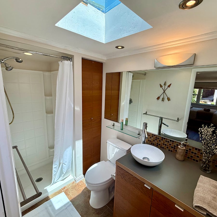 Bathroom with Skylight
Closet with Hanging Space