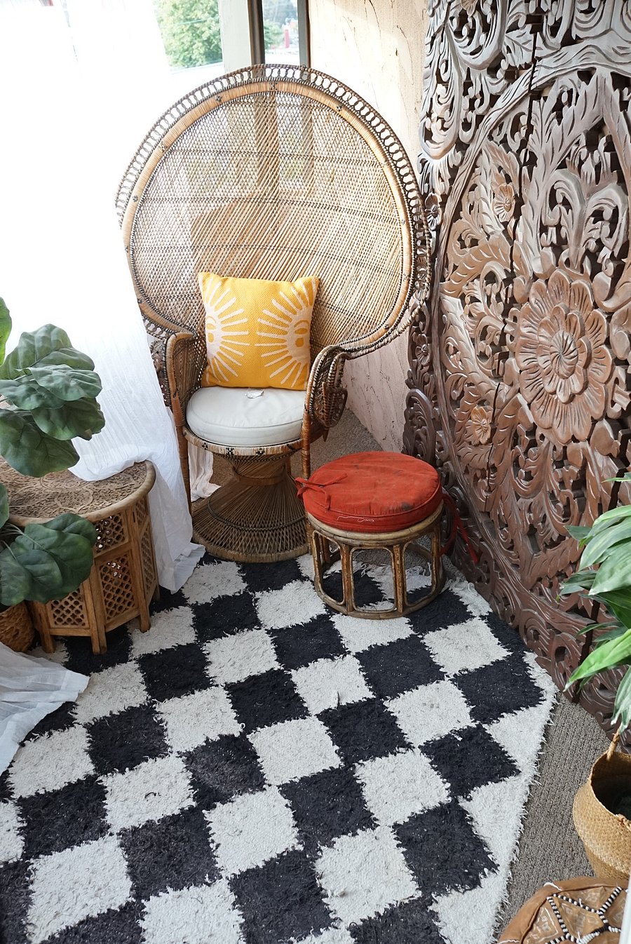 Upstairs (Bedroom 2) personal patio space. Features a true vintage Art Deco (circa 1920s) hand woven Peacock Chair shipped to US from Japanese immigrants during the Depression. This outdoor space has been designed to emphasize peace, tranquility, and resort-like vibes. A personal slice of tranquil Heaven that is yours to use for occupants of Bedroom 2. A 3 panel hand carved Balinese wood frame accents the main wall of the patio, and can serve as a backdrop for yoga, meditation, or personal enjoyment. 