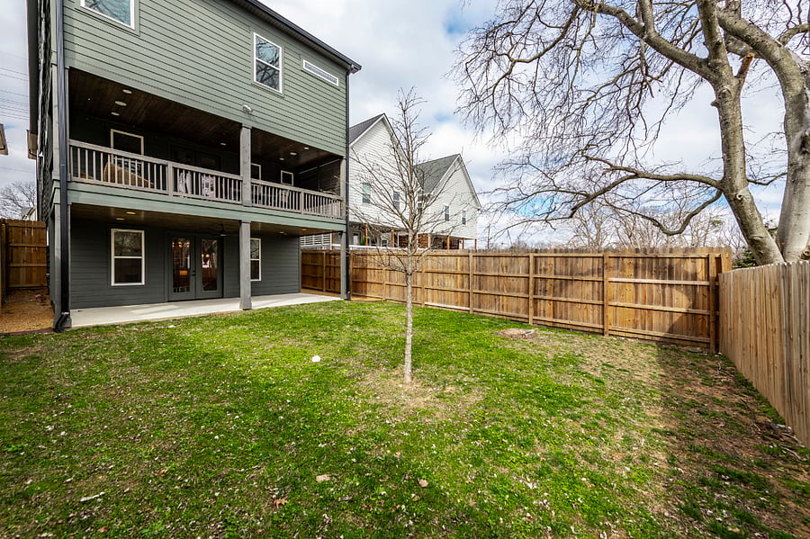 Backyard, patio and entryway to private apartment