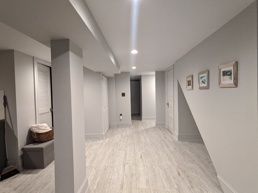 Large hallway (great for yoga!) to the bedroom and bathroom (full washer and dryer are located on the left).