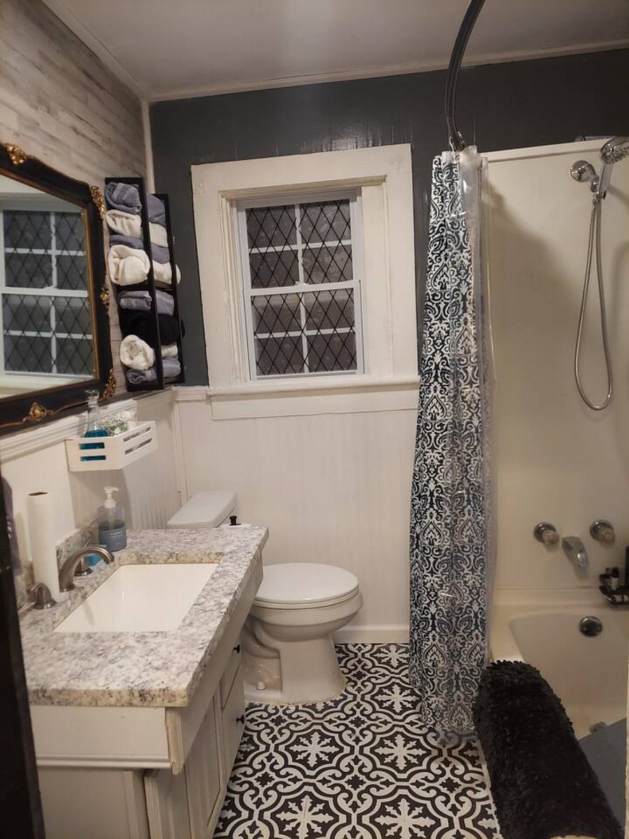 Full bathroom with tub shower combo