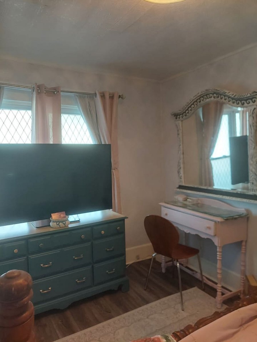Front bright bedroom. Lots of natural ligh but has blackout curtians as well