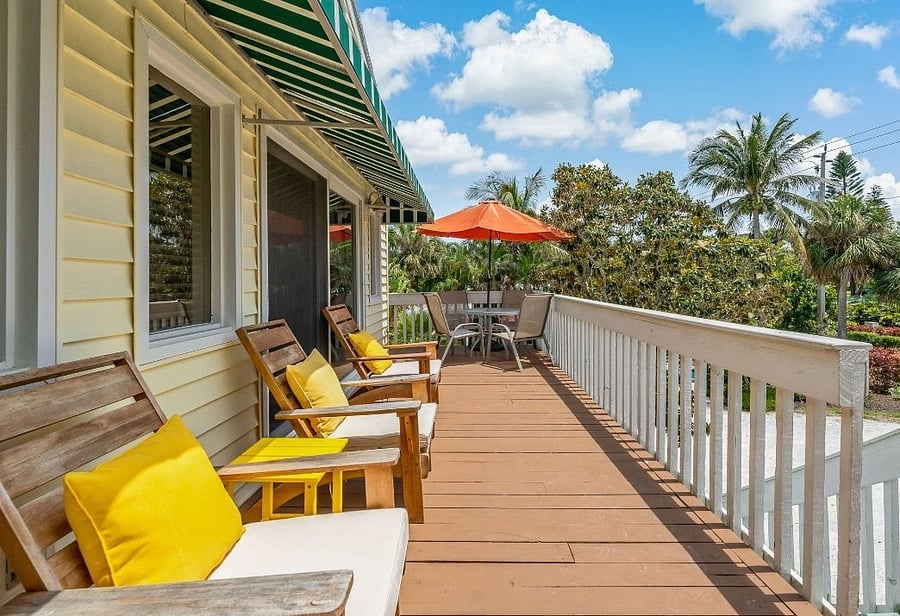Wrap Around Balcony With Pool, Garden and Slight Gulf View.