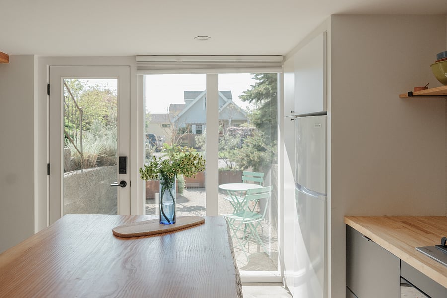 Front entry lets in lots of light and also has a full height privacy screen