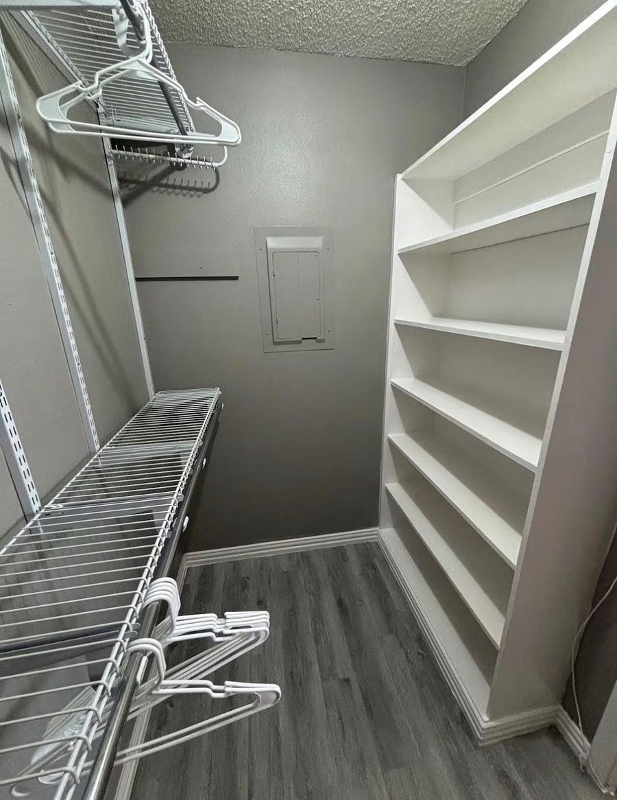 A compact walk-in closet that still provides all the space you need perfect for longer stays or guests traveling with extra outfits and gear.
