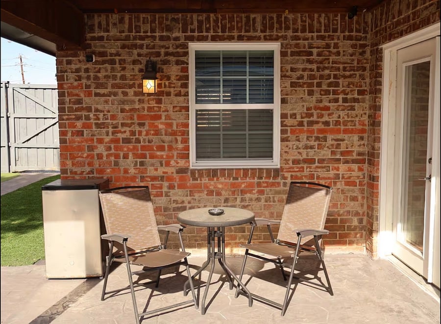 Ideal for couples or solo travelers, the patio space provides a charming retreat with seating and a mini fridge for added convenience.